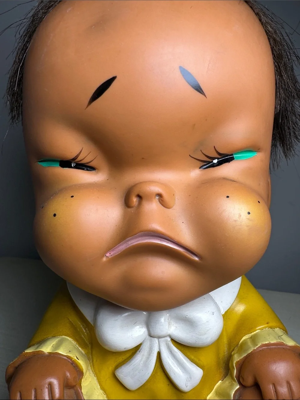 Vintage Moody Cutie grumpy Yellow Baby Doll Figure with Brown Hair Made in Japan